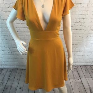 Flirty Yellow NY& C Dress w/ a Deep-V Neckline